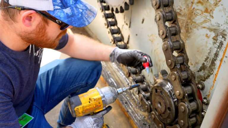 Careers at Marathon - Worker reparing compactor auger